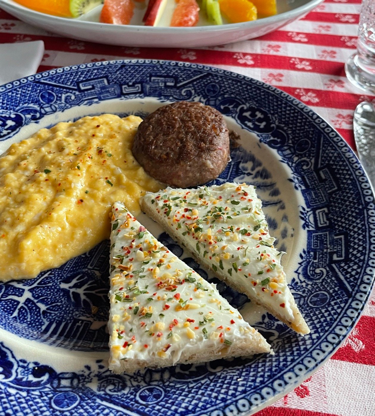 Scrambled eggs and cream cheese toast topped with Bel Air Ranch