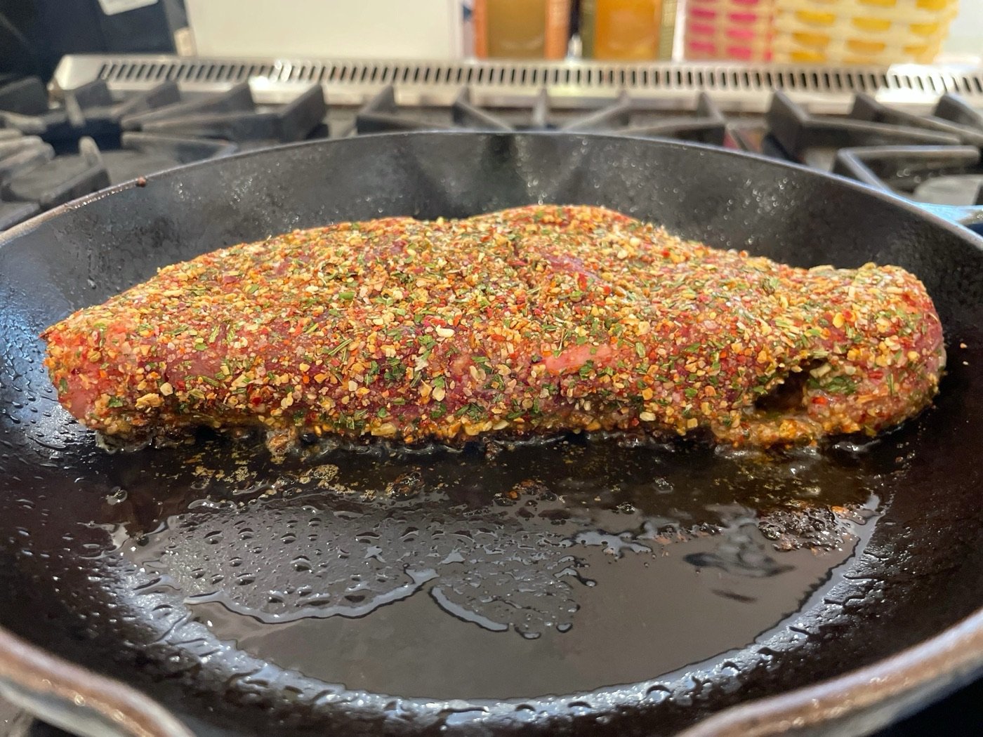 New York strip searing in cast iron